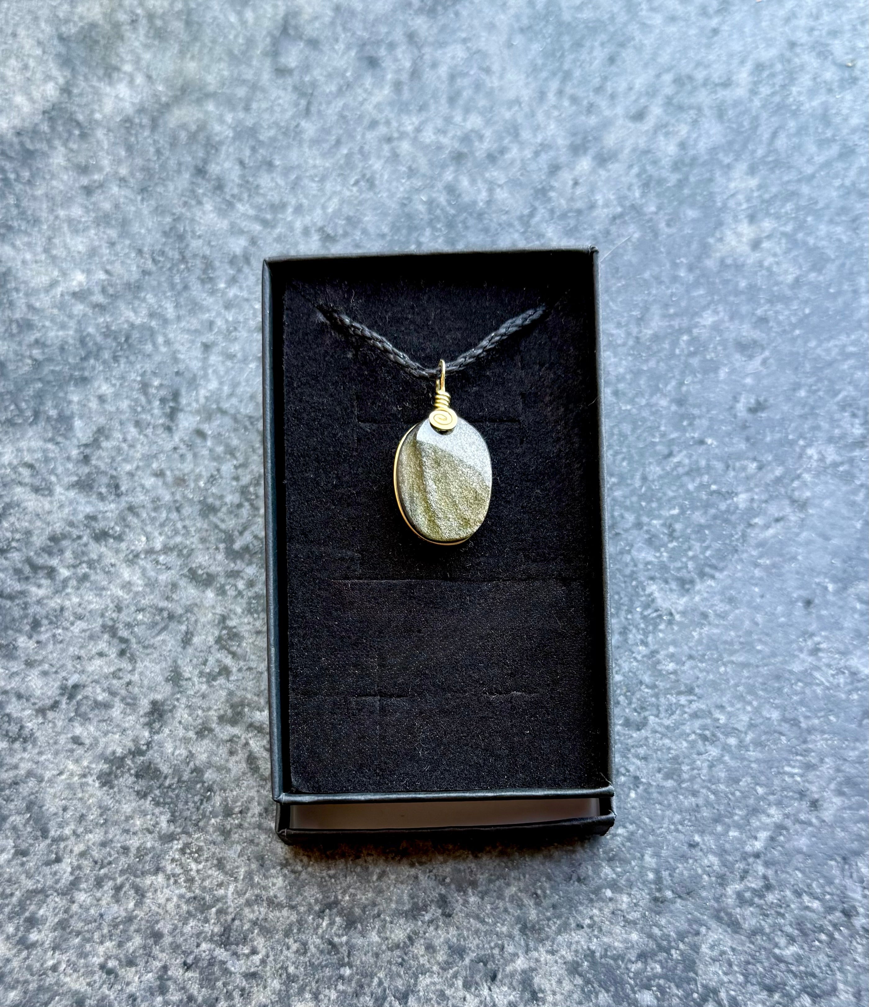 Gold Obsidian Amulet